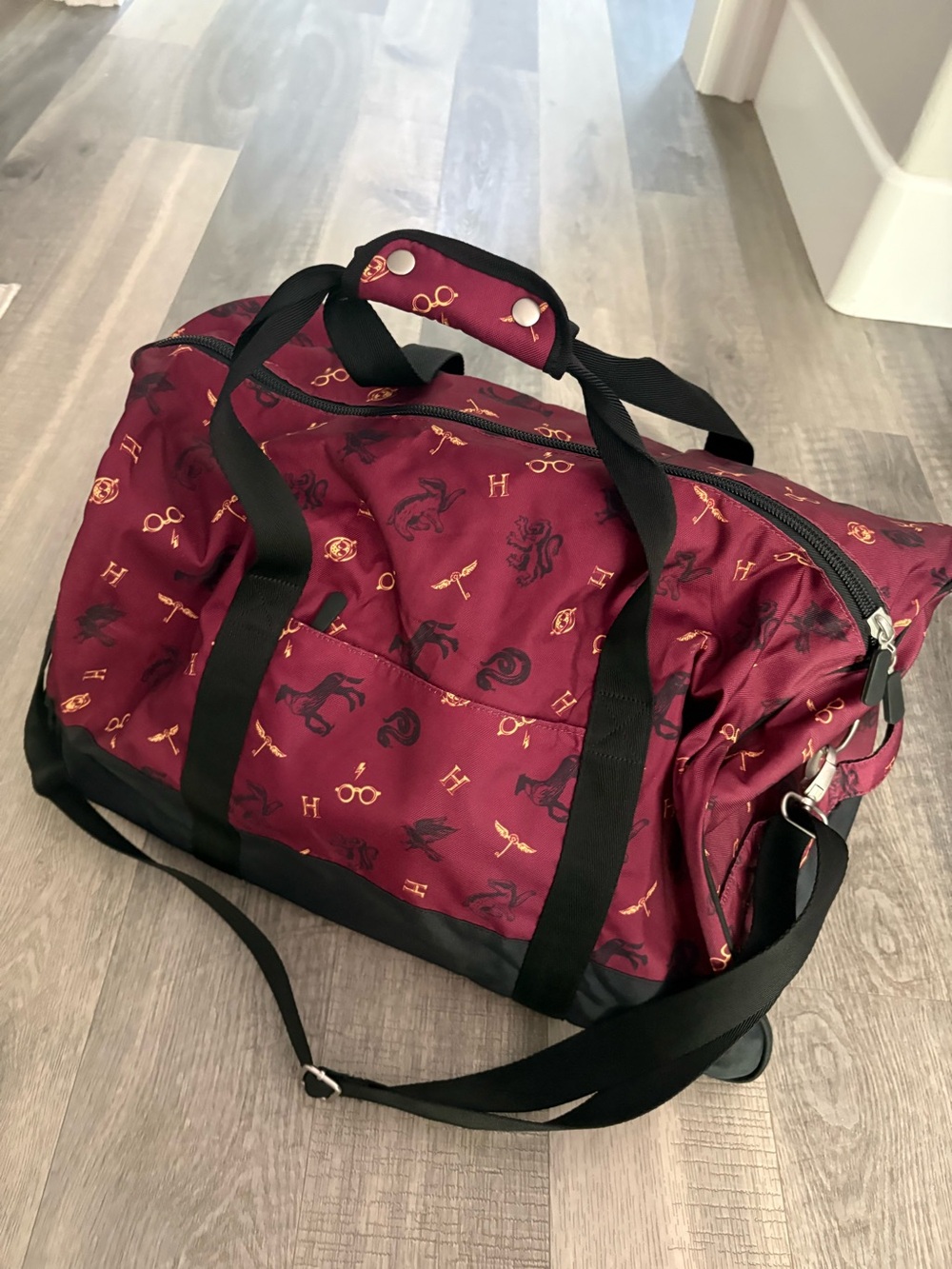 Harry Potter Pottery Barn Burgundy Travel Duffle hogwarts tossed icons